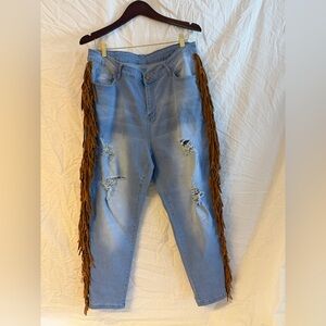 Distressed Light Blue Boyfriend Jeans with Fringe